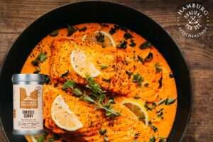 Speicher & consorten - Gericht Lachsfilets in Curry Soße mit Pak Choi
